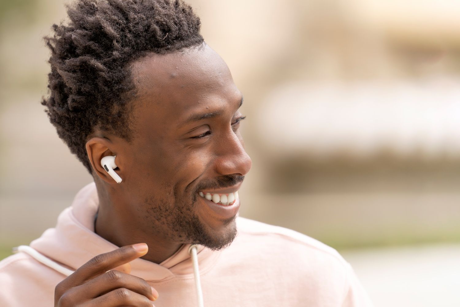 man wearing wireless headphones